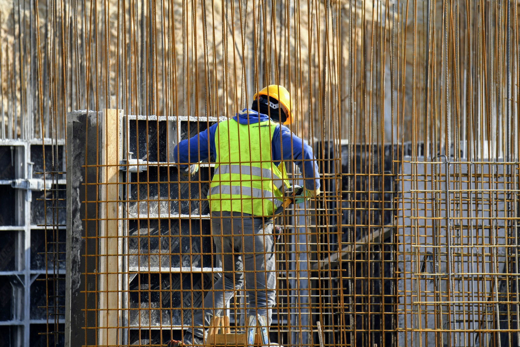 Reference photograph of a tradesperson working on reinforcing steel
